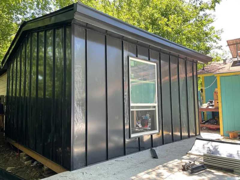 Black standing seam metal wall panels for Roof Inspection in Potomac Mills