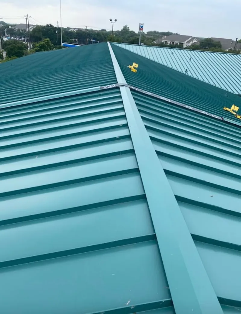 Green commercial metal roof ridge and valley for Metal Roof Repair in Potomac Mills